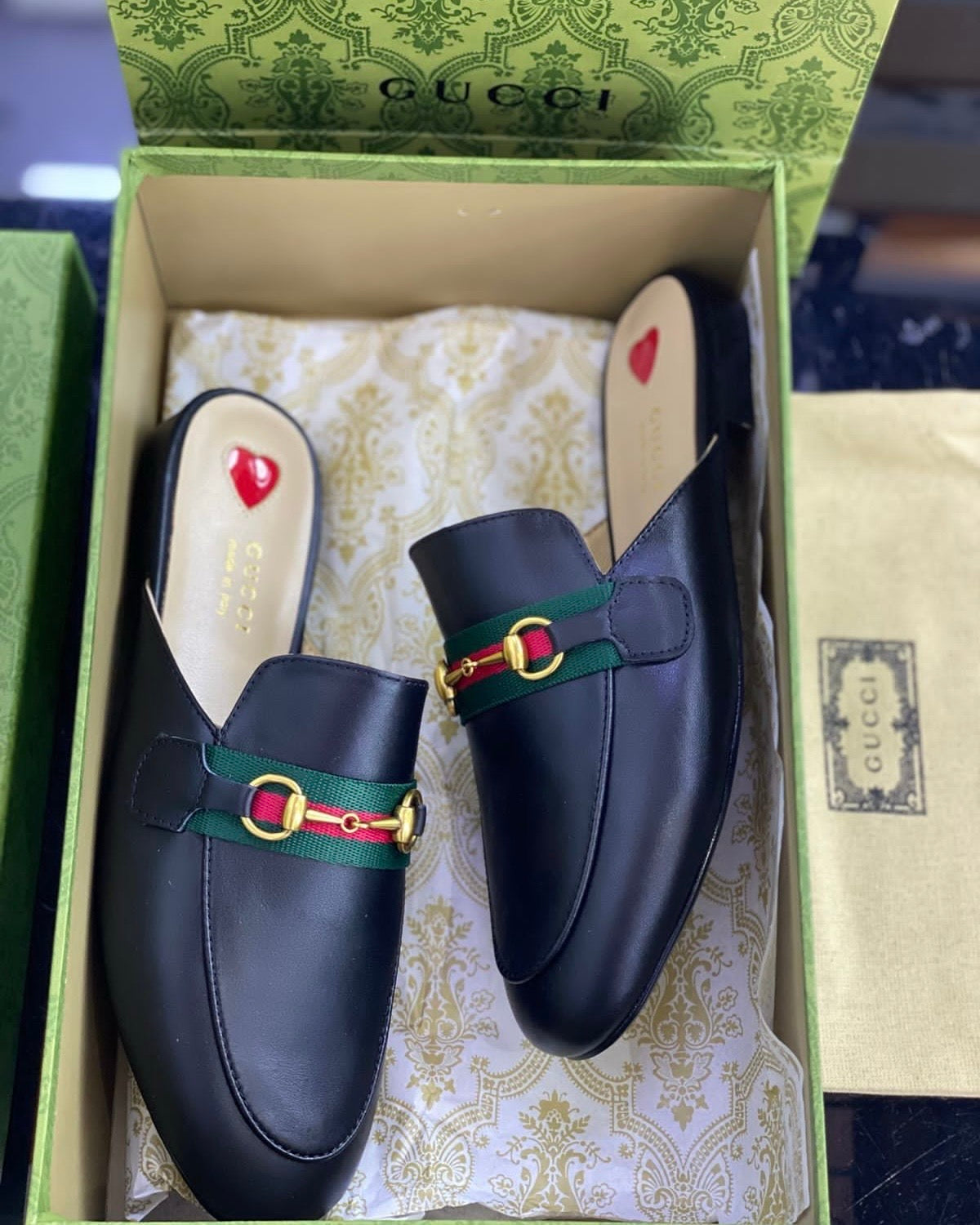 Black Gucci slipper